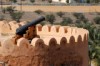 Nakhal Fort - cannon and tower, Rustaq